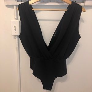 Pretty Little Thing Black One-Piece Bodysuit